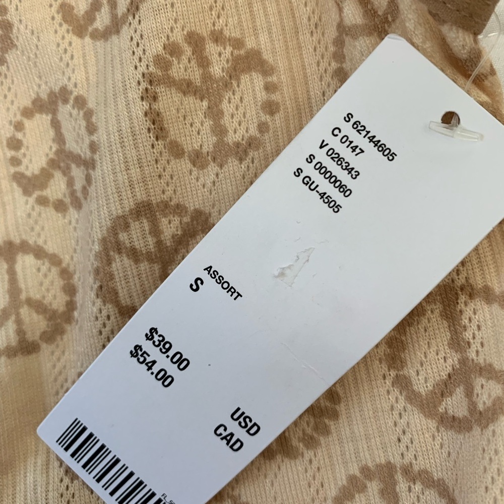 Too big on me or else I’d be keeping never worn brand new